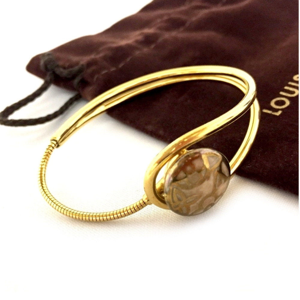 LOUIS VUITTON CELESTE MAGNET GOLD TONE BRACELET - Picture 2 of 16